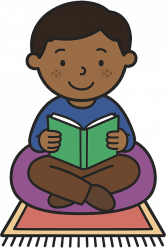 boy sat on beanbag reading a book
